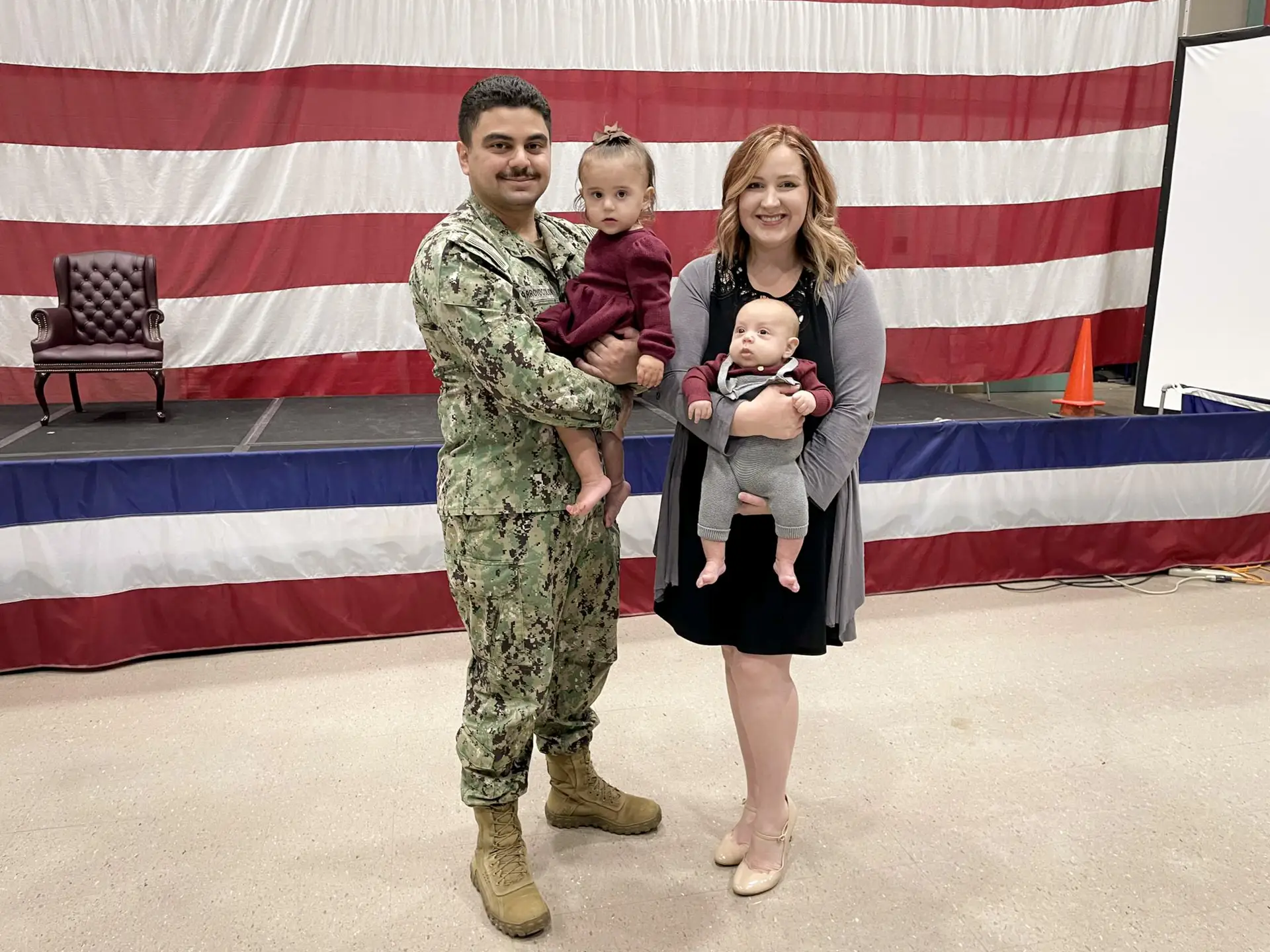 Founder Courtney with her husband and their two children
